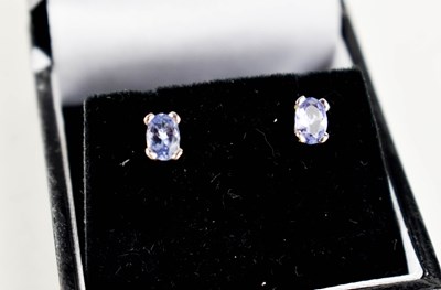 Lot 97 - A pair of Tanzanite and white 18ct gold...
