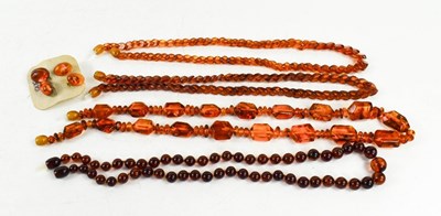 Lot 217 - A group of Baltic amber necklaces, comprising...