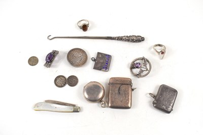 Lot 187 - A selection of silver collectables, to include...