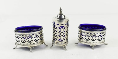 Lot 359 - An Art Deco silver cruet set of two salts and...