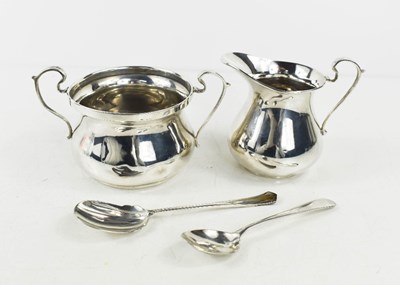 Lot 391 - An Art Deco silver sugar bowl and jug, with...