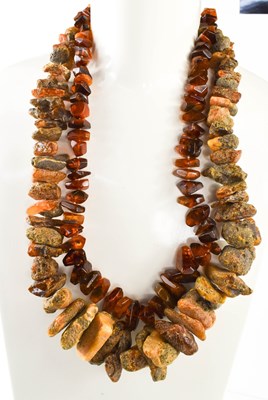 Lot 54A - A large string of unpolished amber nuggets,...