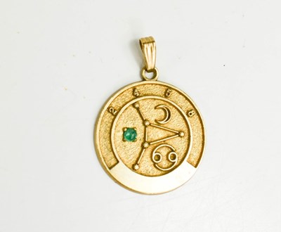 Lot 72 - A 9ct gold astrological pendant, set with a...