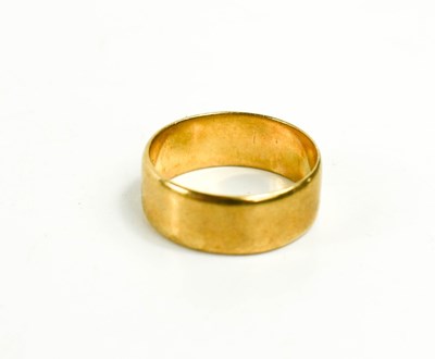 Lot 93 - A 9ct gold wedding band of wide form, size Q/P,...