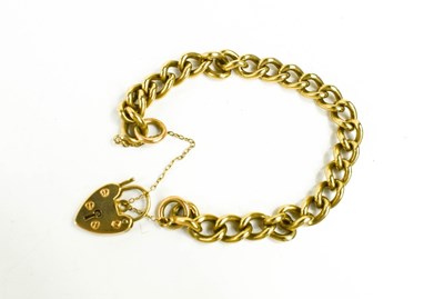 Lot 165 - A 9ct gold curb link charm bracelet with heart...