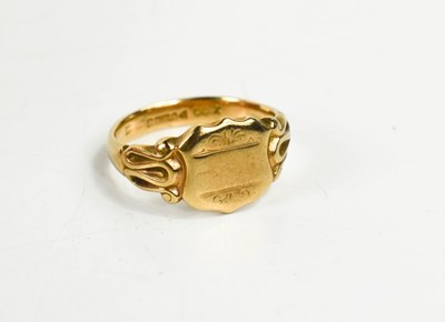 Lot 223 - A 9ct gold signet ring, of shield form with...