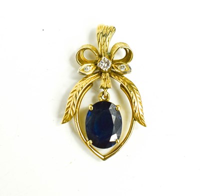 Lot 130 - An 18ct gold diamond and sapphire pendant, the...