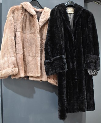 Lot 66 - A black moleskin coat, and a musquash jacket.