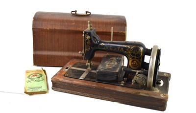 Lot 38 - An antique Vesta hand crank sewing machine...