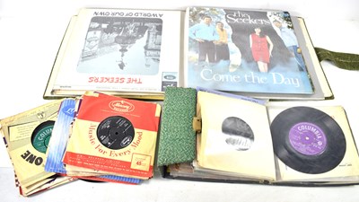 Lot 382 - A group of vinyl records and 7" singles to...