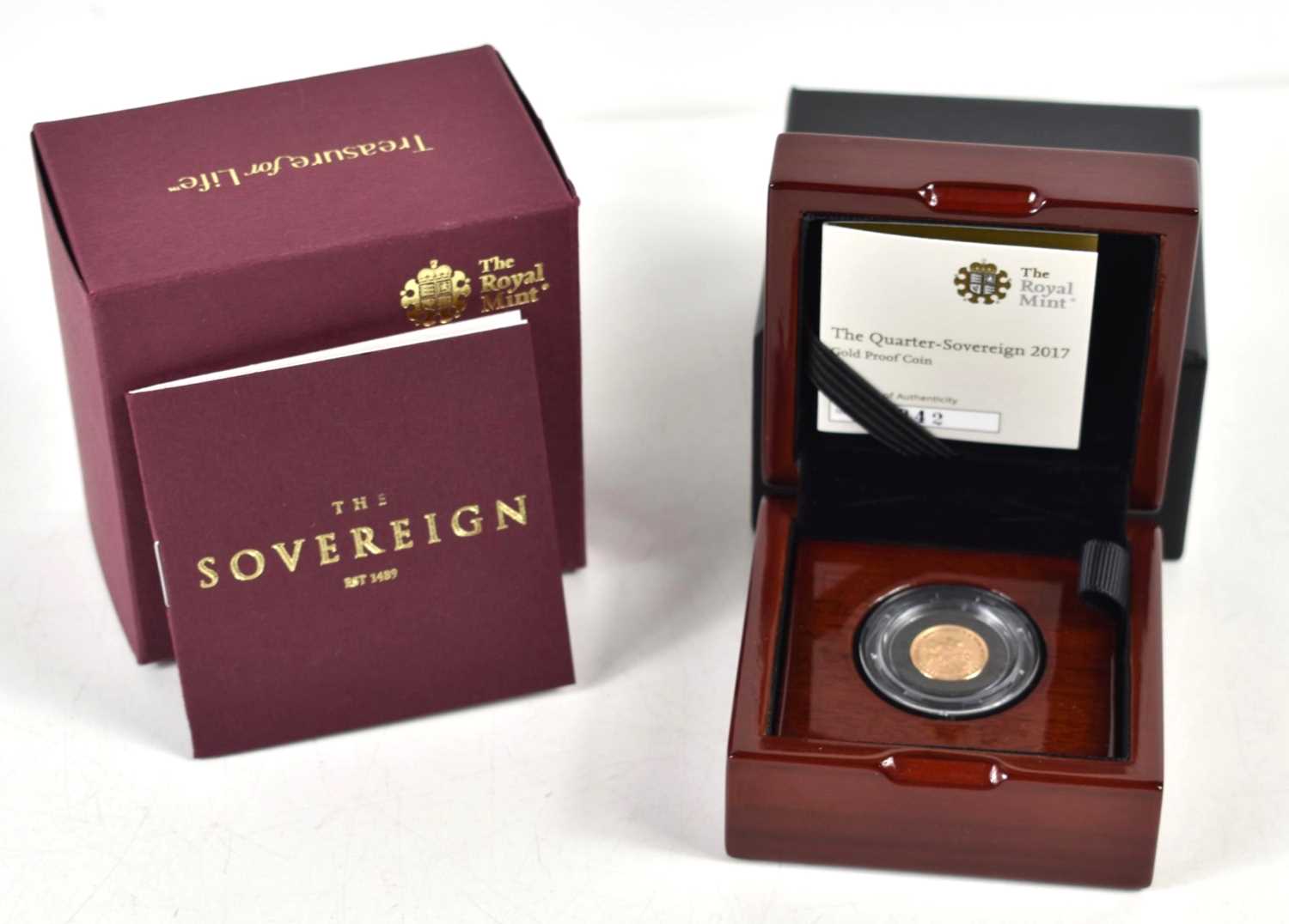 Lot 21 - A Queen Elizabeth II 22ct gold proof quarter...