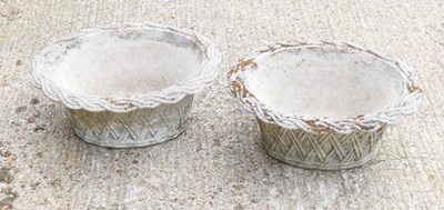 Lot 488 - Two reconstituted stone planters in the form...