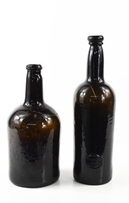 Lot 164 - A 19th century Emanuel College glass bottle,...