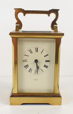 Lot 480 - A brass cased carriage clock retailed by A...