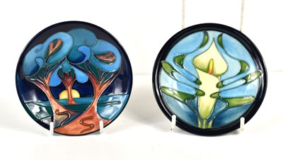 Lot 82 - Two Moorcroft pin dishes, Calla design by Emma...