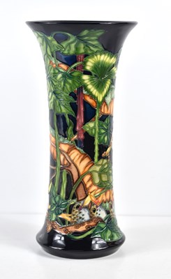 Lot 262 - A Moorcroft vase decorated with a bird feeding...