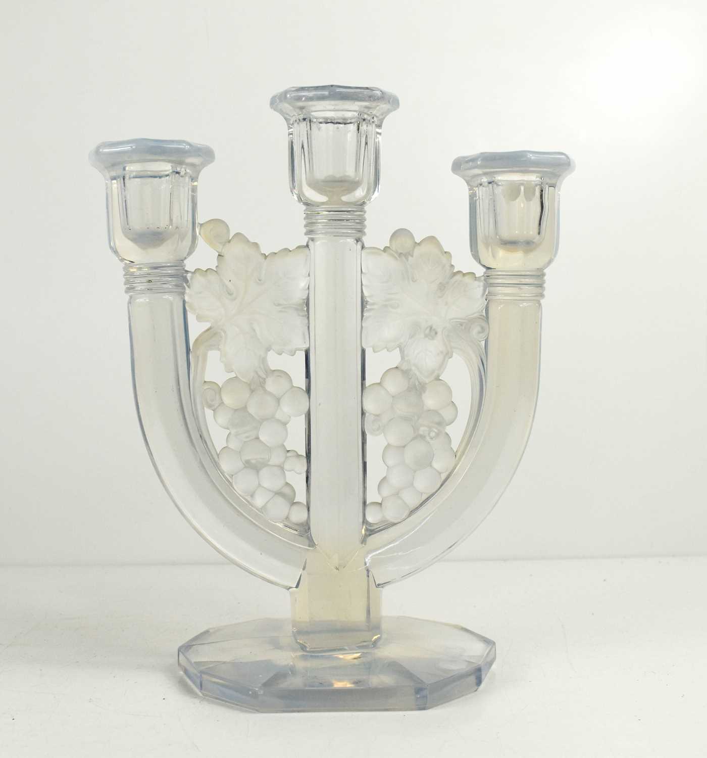 Lot 200 - A Lalique style pressed glass candelabra, the...