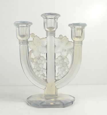 Lot 200 - A Lalique style pressed glass candelabra, the...