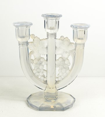 Lot 200 - A Lalique style pressed glass candelabra, the...
