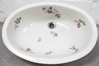 Lot 162 - A porcelain sink of oval form, decorated with...