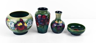 Lot 81 - A group of Moorcroft pottery to include two...