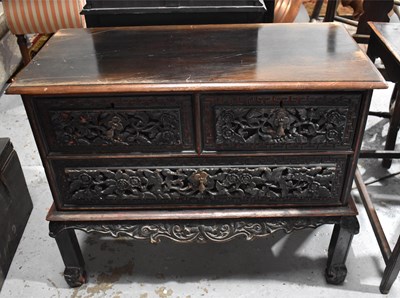 Lot 543 - A 19th century Chinese hardwood cabinet on...