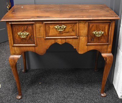 Lot 544 - An 18th century walnut lowboy, the apron front...