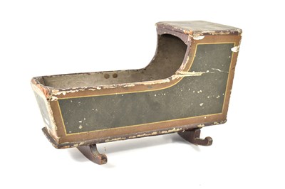 Lot 34 - An antique dolls rocking cradle with residual...