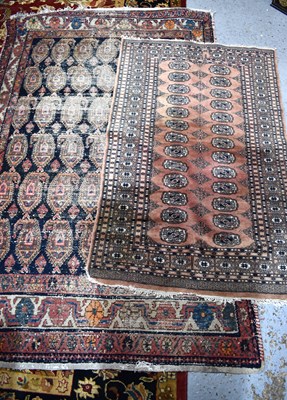 Lot 498 - A finely knotted wool rug the terracotta...