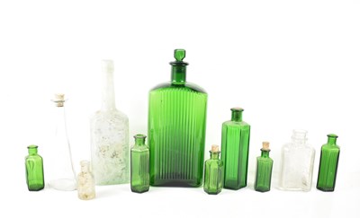 Lot 121 - A group of green and clear apothecary and...