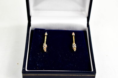 Lot 218 - A pair of 9ct gold earrings, 1.3g, together...