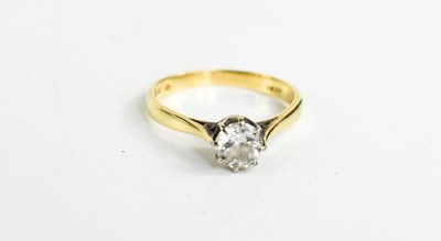 Lot 196 - An 18ct gold and diamond solitaire ring, the...