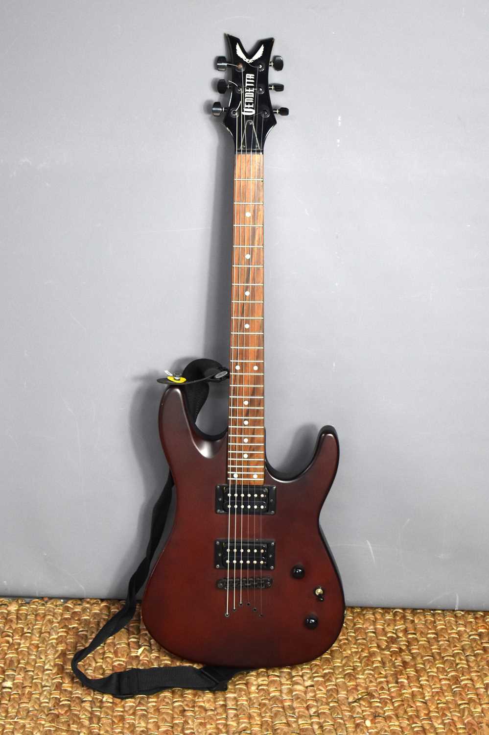 Lot 372 - A Dean "Vendetta" electric guitar, burgundy...