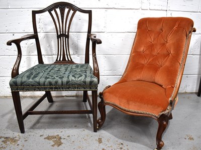 Lot 502 - A Victorian mahogany nursing chair with orange...