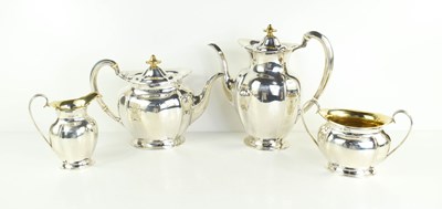 Lot 429 - An Edwardian silver tea set comprising tea pot,...