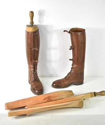 Lot 107 - A pair of brown leather riding boots made by...