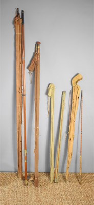 Lot 111 - A group of antique fishing rods to include...