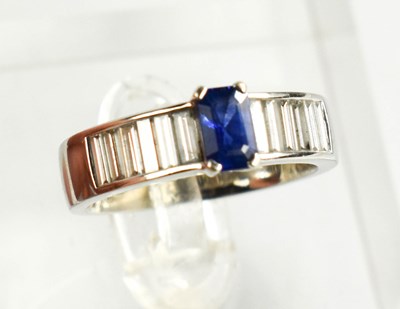 Lot 26 - A white gold, sapphire and diamond ring, the...