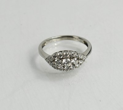 Lot 22 - A white metal, and diamond set cluster ring,...
