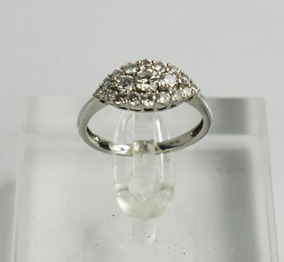 Lot 22 - A white metal, and diamond set cluster ring,...