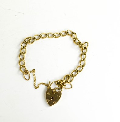 Lot 142 - A 9ct gold curb link charm bracelet with heart...