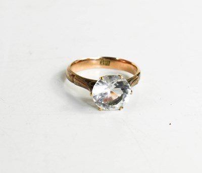 Lot 144 - A 14ct gold ring set with clear paste stone,...