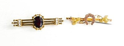 Lot 74 - A 9ct gold stock pin or bar brooch, with...