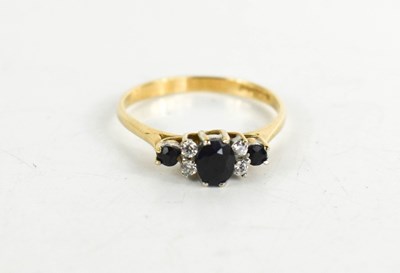 Lot 277 - A 9ct gold and paste ring, set with dark blue...