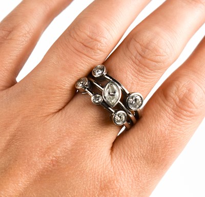 Lot 12 - A platinum and diamond 'bubble' ring by Heidi...