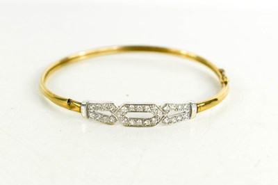 Lot 120 - A 9ct gold and paste set bangle, internal...