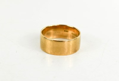 Lot 97 - A 9ct gold wedding band, 7.6mm wide, size O, 4....