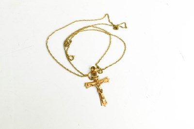 Lot 230 - A 9ct gold crucifix pendant, 1.25g with fine...