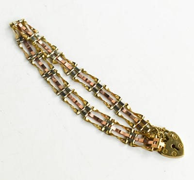 Lot 114 - A 9ct gold gate link bracelet, with heart form...