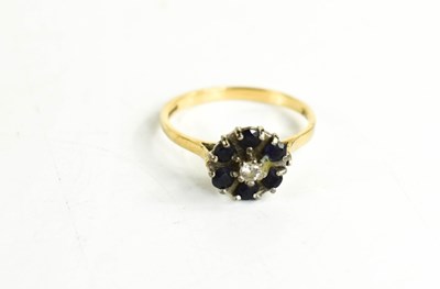 Lot 228 - A 9ct gold, diamond and sapphire flowerhead...